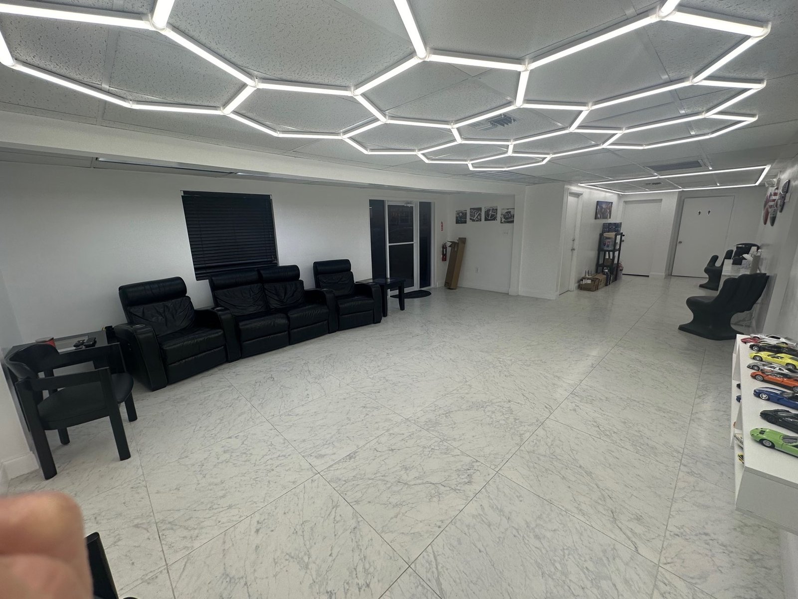Another view of the lounge and hexagon lighting