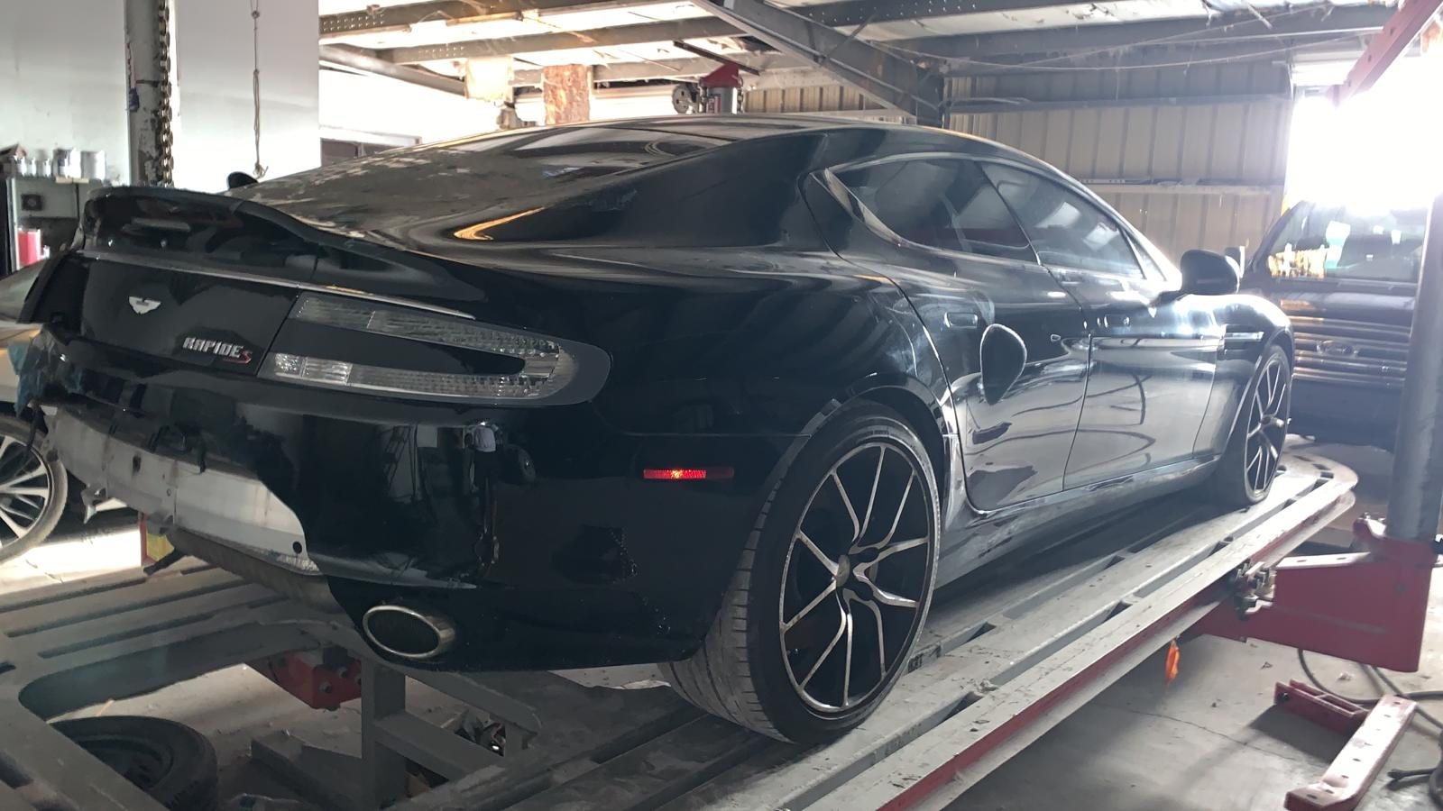 Rear quarter of the Aston Martin during repair